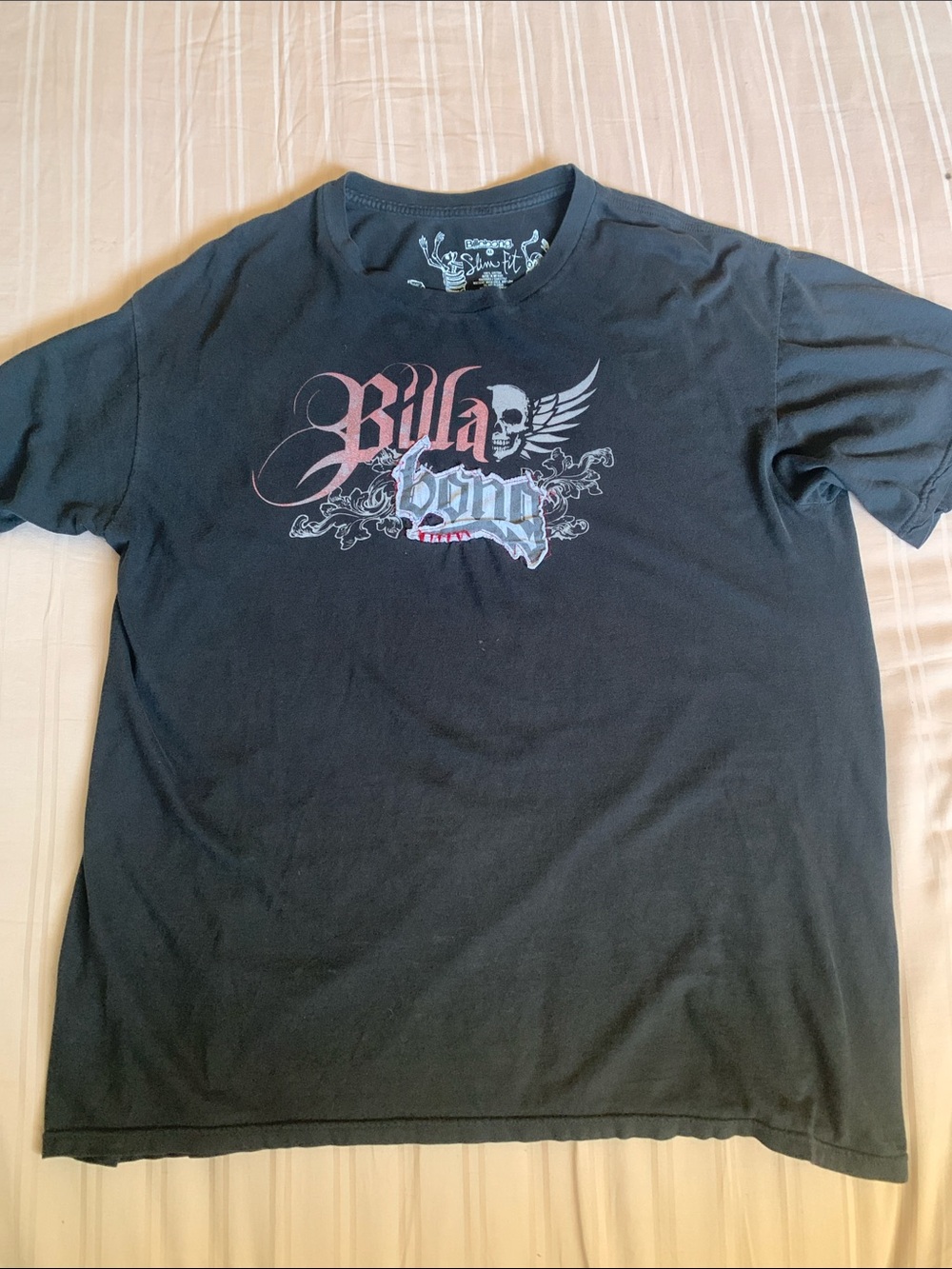 Vintage Billabong Black Tee with Winged Skull Graphic